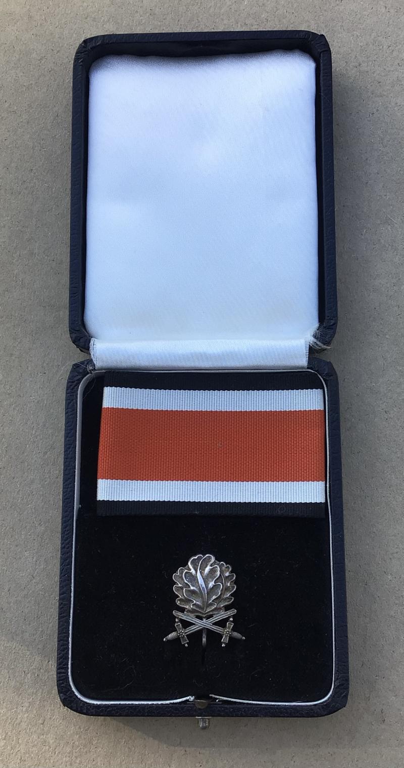 German Federal Republic Cased Oak Leaves and Swords to the 1939 Knights Cross of the Iron Cross