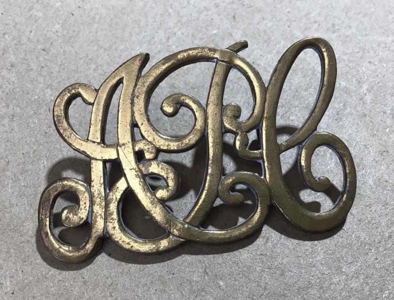 A Victorian Period Large Pattern Army Pay Corps Cap Badge / Brass Shoulder Title